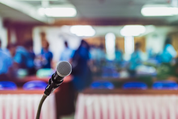 Blurred and Soft focus of head microphone on stage of Education conference or event whit blurred background,Education meeting and event on stage concept and copy space