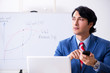 © Elnur - Busy businessman explaining business charts