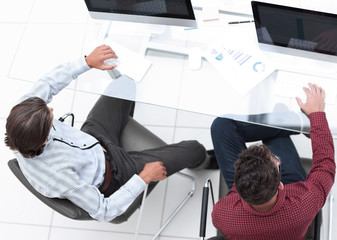 Wall Mural - business partners sitting at a Desk