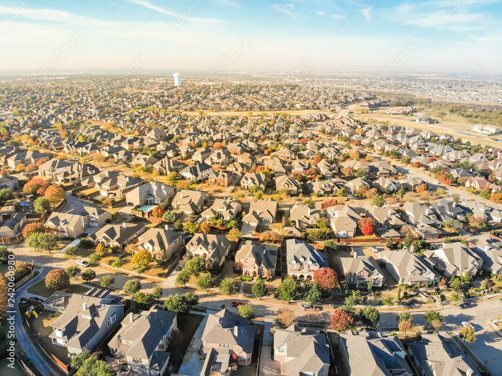 Aerial view new development neighborhood in Cedar Hill, Texas, USA in morning fall with colorful leaves. A city in Dallas and Ellis counties located approximately 16 miles southwest of downtown Dallas