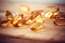 Close Up The Vitamin D And Omega 3 Fish Oil Capsules Supplement  For Good Brain , Heart And Health Eating Benefit