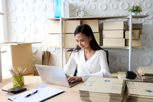 Young Asian Girl Is Freelancer Start Up Small Business Owner Writing Address On Cardboard Box At Workplace,Shipping Shopping Online Small Business Entrepreneur SME Or Freelance
