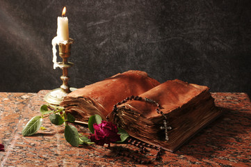 Wall Mural - Old bible and burning candle