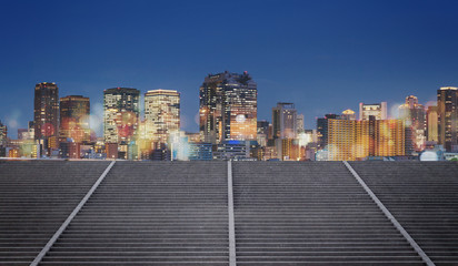 Canvas Print - Japan, Osaka city at night with colorful lights and Bokeh and concrete stairways. City background	