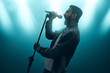 © fotokitas - Singer singing with microphone