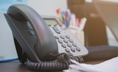 Wall Mural - close up telephone landline at office table concept