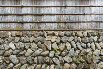 Aufkleber - Stone wall and bamboo fence for pattern and background