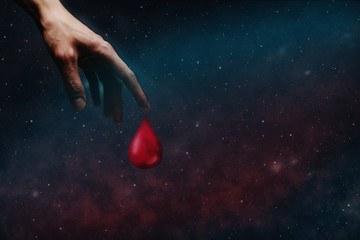 Poster - Human hand blood drop. Nebula dust in infinite space. World Blood Donor Day. Mixed media.