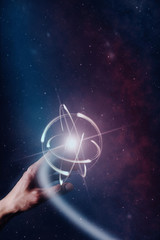Aufkleber - Human forefinger touches atom. Nebula dust  in infinite space. Mixed media.
