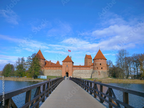 Fotografering Amazing landscape view of Trakai castle and wooden bridge before the gates, Lith