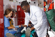 © JackF - Emergency doctors fixing  patient on stretcher