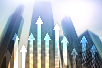 Up arrow graph on skyscraper background. Invesment and financial growth concept.