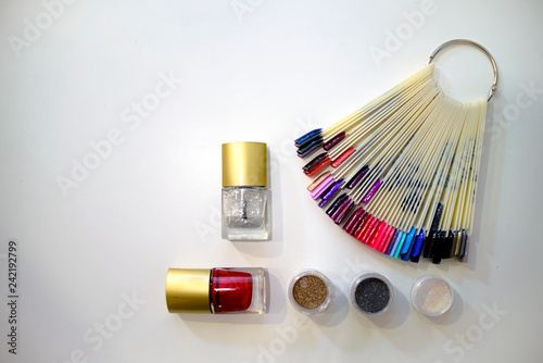 Fotografie, Obraz Composition of nail polish, glitter and bright nail samples