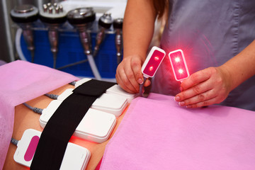 lipo laser. Hardware cosmetology. Body care. Non surgical body sculpting. body contouring treatment, anti-cellulite and anti-fat therapy in beauty salon.