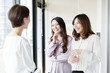 © taka - asian businesswomen working in office