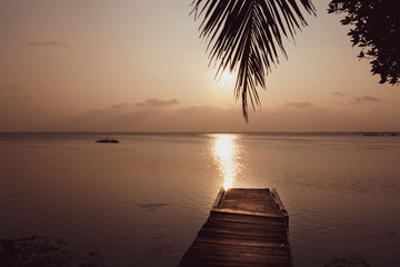 Wall Mural - Beautiful sunset reflected in the lake.