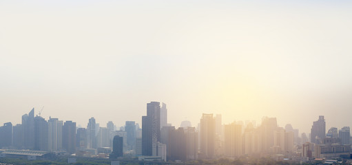 Landscape view of Bangkok city background with rays of sunlight.