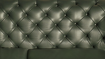 Wall Mural - Green leather couch upholstery background