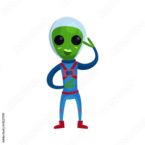 Fényképezés Friendly smiling green alien with big eyes wearing blue space suit waving his ha