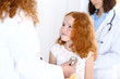 © rogerphoto - Doctor examining a little girl with stethoscope.Medicine and healthcare concept