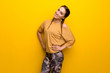 Sport woman on vibrant yellow background