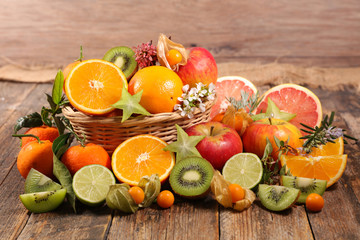  assorted fruit on wood background