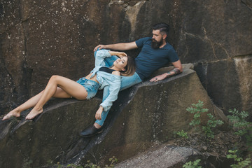 Wall Mural - Joy of being in love. Sexy woman and bearded man on natural landscape. Sensual couple on vacation trip. Couple in love on summer vacation. The best romantic vacation for couple