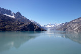 Fototapeta Do pokoju - Glacier Flowing Into Lake In Alaska USA