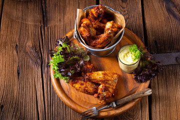 Wall Mural - savory spiced chicken wings from the oven