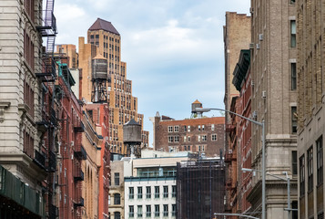 View of the old buildings and water towers in the Tribeca neighborhood of Manhattan, New York City