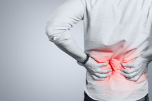 Man Suffering From A Lower Back Pain