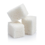Fototapeta  - Close-up of three white sugar cubes, isolated on white background