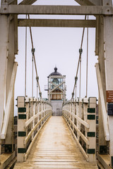 Wall Mural - Point Bonita Lighthouse on a foggy day, Marin Headlands, San Francisco bay area, California