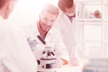 Wall Mural - background image science team in the lab