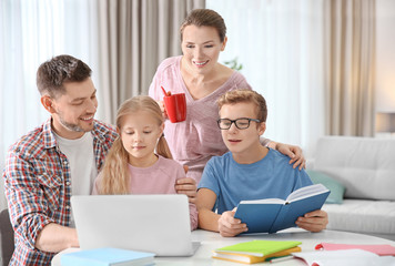 Poster - Children with parents doing homework at home