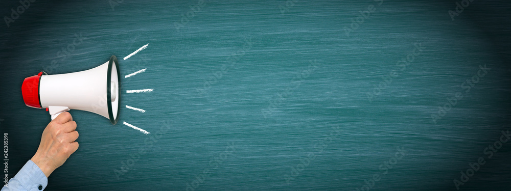 Megaphone with hand on green chalkboard background, copyspace for individual text - obrazy, fototapety, plakaty 