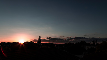  sunset in the city in panorama