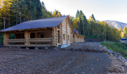 Camring in the mountain houses made of natural wood for families.