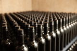 Fototapeta  - Bottles of wine in winecellar redy for packing and delivery