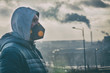 © Monika Wisniewska - Man wearing a real anti-pollution, anti-smog and viruses face mask