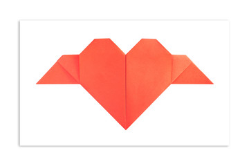 Origami. Red heart of paper on white background. The concept of minimalism. Valentine's day