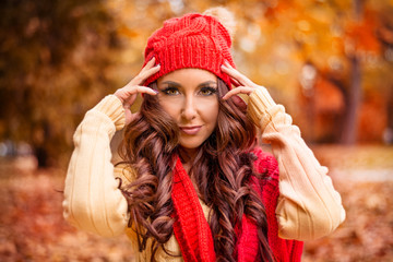 Beautiful woman in autumn park