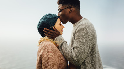Wall Mural - loving interracial couple together