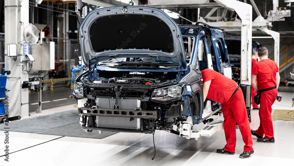 assembling a car - production of a vehicle Stock Photo | Adobe Stock