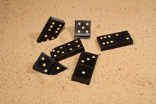 Dominoes On The Yellow Sand