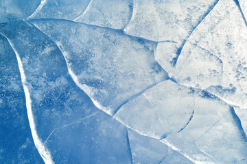 Wall Mural - abstract ice background. blue background with cracks on the ice surface