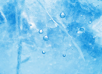 Wall Mural - abstract ice background. blue background with cracks on the ice surface
