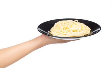 hand holding Spaghetti pasta in a dish isolated on white background