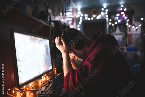 Portrait of the frustrated gamer with his downed hands losing in the game Canvas Print