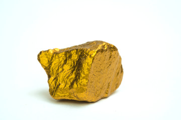 Closeup of gold nugget or gold ore on white background, precious stone or lump of golden stone, financial and business concept.